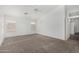 Bright and airy bedroom features neutral walls and carpet with multiple windows and ceiling fan at 11303 E Pratt Ave, Mesa, AZ 85212