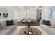 Dining room featuring a table with seating for six and neutral tones at 11303 E Pratt Ave, Mesa, AZ 85212