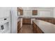 Well-equipped kitchen with tile floors, updated appliances and a large center island at 11303 E Pratt Ave, Mesa, AZ 85212