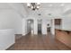 Open floor plan featuring tile floors that flow between the kitchen and living spaces at 11303 E Pratt Ave, Mesa, AZ 85212