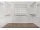 Organized walk-in closet featuring shelving and hanging rods, ready for storage solutions at 11303 E Pratt Ave, Mesa, AZ 85212