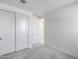 Bright bedroom features ample closet space, neutral walls and plush carpeting at 13171 W Redstone Dr, Peoria, AZ 85383