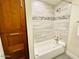 Bathroom with tile and built-in shelves at 133 W Balboa Dr, Tempe, AZ 85282
