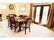 Dining room with glass doors to patio at 133 W Balboa Dr, Tempe, AZ 85282
