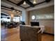 Elegant restaurant interior featuring a stylish reception area and inviting dining space with tables and chairs at 13444 W Cabrillo Dr, Sun City West, AZ 85375