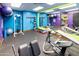 Bright fitness center with exercise machines, free weights, and mirror, set against colorful walls at 1640 E Augusta Ave, Chandler, AZ 85249