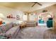 Cozy living room featuring plush carpeting, neutral walls, and large windows for abundant natural light at 1640 E Augusta Ave, Chandler, AZ 85249