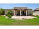 Charming backyard featuring a tiled patio, grill, and manicured landscaping at 1804 W Magdalena Ln, Phoenix, AZ 85041