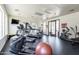 Well-equipped fitness center featuring treadmills, elliptical, TV and weights for resident use at 1825 W Ray Rd # 1134, Chandler, AZ 85224