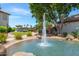 Scenic fountain on the community lake surrounded by lush landscaping at 1825 W Ray Rd # 1134, Chandler, AZ 85224