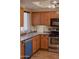 Functional kitchen with stainless steel appliances and ample cabinet space, highlighting the kitchen's efficiency and storage at 1825 W Ray Rd # 1134, Chandler, AZ 85224