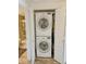Convenient laundry closet featuring stacked washer and dryer, offering space-saving laundry solution at 1825 W Ray Rd # 1134, Chandler, AZ 85224