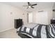 Bedroom with dark dresser and closet near the bed at 18401 W Westfall Way, Surprise, AZ 85374