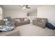 Living room with neutral color scheme, comfortable sofas, and a cozy atmosphere for Gathering gatherings at 18401 W Westfall Way, Surprise, AZ 85374