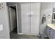 Bathroom features storage space and sink with modern fixtures at 19014 N 91St Dr, Peoria, AZ 85382