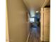 Comfortable bedroom boasts large windows, soft carpeting, and a ceiling fan at 19014 N 91St Dr, Peoria, AZ 85382
