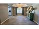 Dining area features wood-look floors, a chandelier, and natural light at 19014 N 91St Dr, Peoria, AZ 85382
