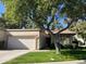 Charming single-story home with well-maintained landscaping and attached garage at 19014 N 91St Dr, Peoria, AZ 85382