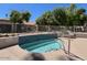 Community hot tub with tile accents and seating area at 19014 N 91St Dr, Peoria, AZ 85382