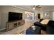 Bright living room featuring wood-look floors, open layout, and neutral paint at 19014 N 91St Dr, Peoria, AZ 85382
