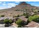 Aerial view of property and neighborhood with mountain views at 1922 E Everett Dr, Phoenix, AZ 85022