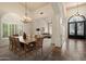 Open-concept dining area offering abundant natural light and an adjacent living area at 1922 E Everett Dr, Phoenix, AZ 85022