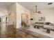 Spacious living room featuring tile accents, an open floor plan, and stylish furnishings at 1922 E Everett Dr, Phoenix, AZ 85022