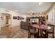Relaxing living room area with a comfortable sofa, ceiling fan, and built-in shelving at 1922 E Everett Dr, Phoenix, AZ 85022