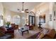 Spacious living room with high ceilings, large windows, and elegant furnishings at 1922 E Everett Dr, Phoenix, AZ 85022