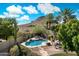 Backyard oasis with private pool, desert landscaping, and mountain views at 1922 E Everett Dr, Phoenix, AZ 85022