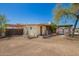 Exterior backyard view with gardening beds and a patio leading to a refreshing pool area at 19251 N 17Th Dr, Phoenix, AZ 85027