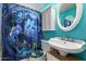 Bathroom featuring ocean themed shower curtain and round mirror at 19251 N 17Th Dr, Phoenix, AZ 85027