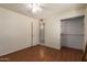 Bedroom with wood floors and closet at 19251 N 17Th Dr, Phoenix, AZ 85027