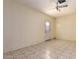 Bright bedroom with tiled floors and access to the backyard at 19251 N 17Th Dr, Phoenix, AZ 85027
