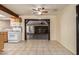 Bright kitchen with tiled floors and views into the living room at 19251 N 17Th Dr, Phoenix, AZ 85027