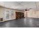 This living room has patio door access, and a brick fireplace at 19251 N 17Th Dr, Phoenix, AZ 85027