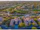 Panoramic aerial view of a community with lush landscaping, green golf course, and beautiful homes at 19475 N Grayhawk Dr # 1039, Scottsdale, AZ 85255