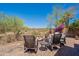 Spacious backyard featuring a built-in fire pit and comfortable seating perfect for enjoying the outdoors at 19475 N Grayhawk Dr # 1039, Scottsdale, AZ 85255