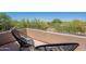 Inviting balcony featuring comfortable seating and scenic views of lush landscaping at 19475 N Grayhawk Dr # 1039, Scottsdale, AZ 85255