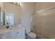 Clean bathroom features a shower-tub combo, bright vanity, and well-lit mirror at 19475 N Grayhawk Dr # 1039, Scottsdale, AZ 85255