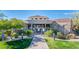 Inviting community center with a circular design, stone facade, and manicured landscaping at 19475 N Grayhawk Dr # 1039, Scottsdale, AZ 85255