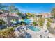 Upscale community pool area offering a relaxing spa, grilling station and desert landscaping at 19475 N Grayhawk Dr # 1039, Scottsdale, AZ 85255