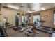 Spacious exercise room with modern equipment, offering residents a convenient fitness option within the community at 19475 N Grayhawk Dr # 1039, Scottsdale, AZ 85255
