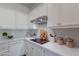 Modern kitchen featuring sleek countertops, ample storage, and stainless steel appliances for a functional design at 19475 N Grayhawk Dr # 1039, Scottsdale, AZ 85255