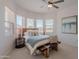 Bright main bedroom with large windows offering natural light, complemented by elegant furnishings at 19475 N Grayhawk Dr # 1039, Scottsdale, AZ 85255