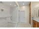 Luxurious bathroom featuring a glass enclosed shower with marble bench seating and cabinets at 19475 N Grayhawk Dr # 1115, Scottsdale, AZ 85255