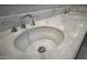 Elegant marble countertop and double sink, with stainless steel faucets and hardware, along with a white porcelain sink at 19475 N Grayhawk Dr # 1115, Scottsdale, AZ 85255