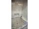 A glass shower with white marble walls, with a marble bench, and a mosaic floor, along with stainless steel hardware at 19475 N Grayhawk Dr # 1115, Scottsdale, AZ 85255