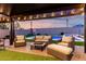 Lush backyard features a sparkling pool and a cozy outdoor seating area at 2052 E Scorpio Pl, Chandler, AZ 85249