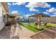 Inviting backyard features a pool view, covered patio, gazebo and outdoor seating at 2052 E Scorpio Pl, Chandler, AZ 85249